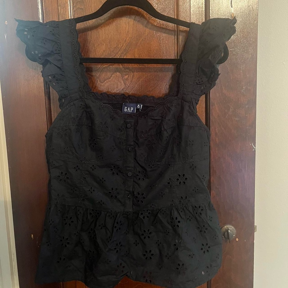 Gap black pointelle tank with smocking in back, size medium.